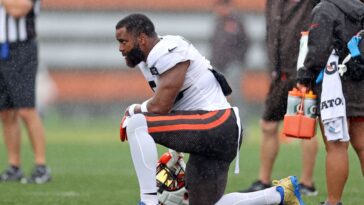 Cleveland Browns linebacker Anthony Walker Jr. watches play from the sidelines