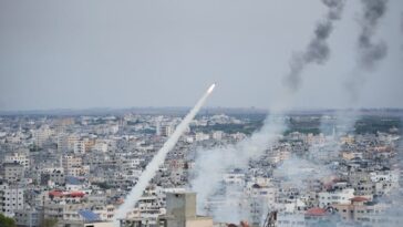 Rockets are launched toward Israel, from Gaza, on Saturday, Oct. 7, 2023.