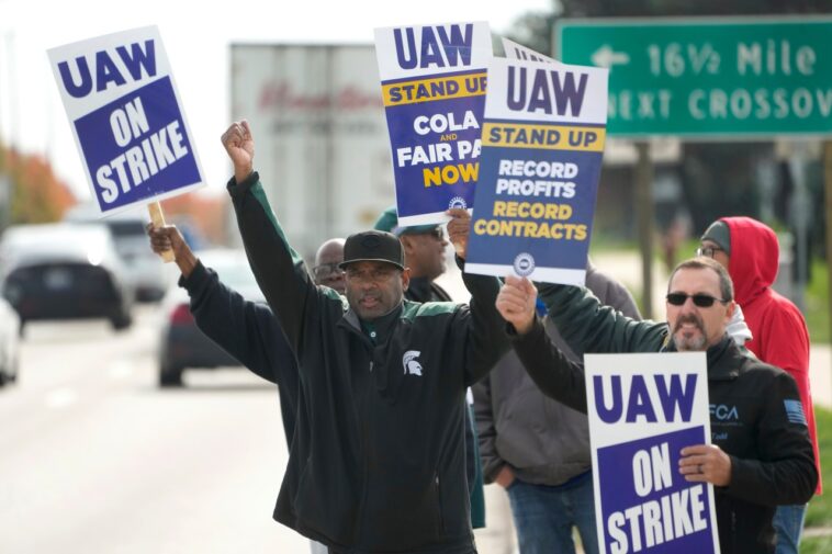 UAW and Stellantis reach tentative contract deal as union adds strike at Tennessee GM factory